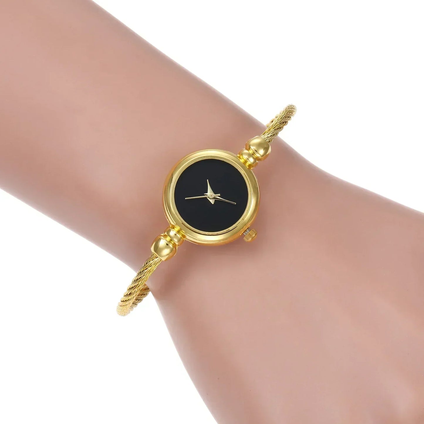 π Elegant Small Gold Bangle Watch