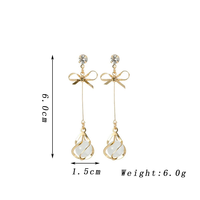 π Opal Bow Dangle Earrings